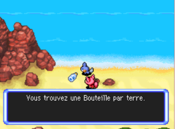 Une bouteille sur la plage.