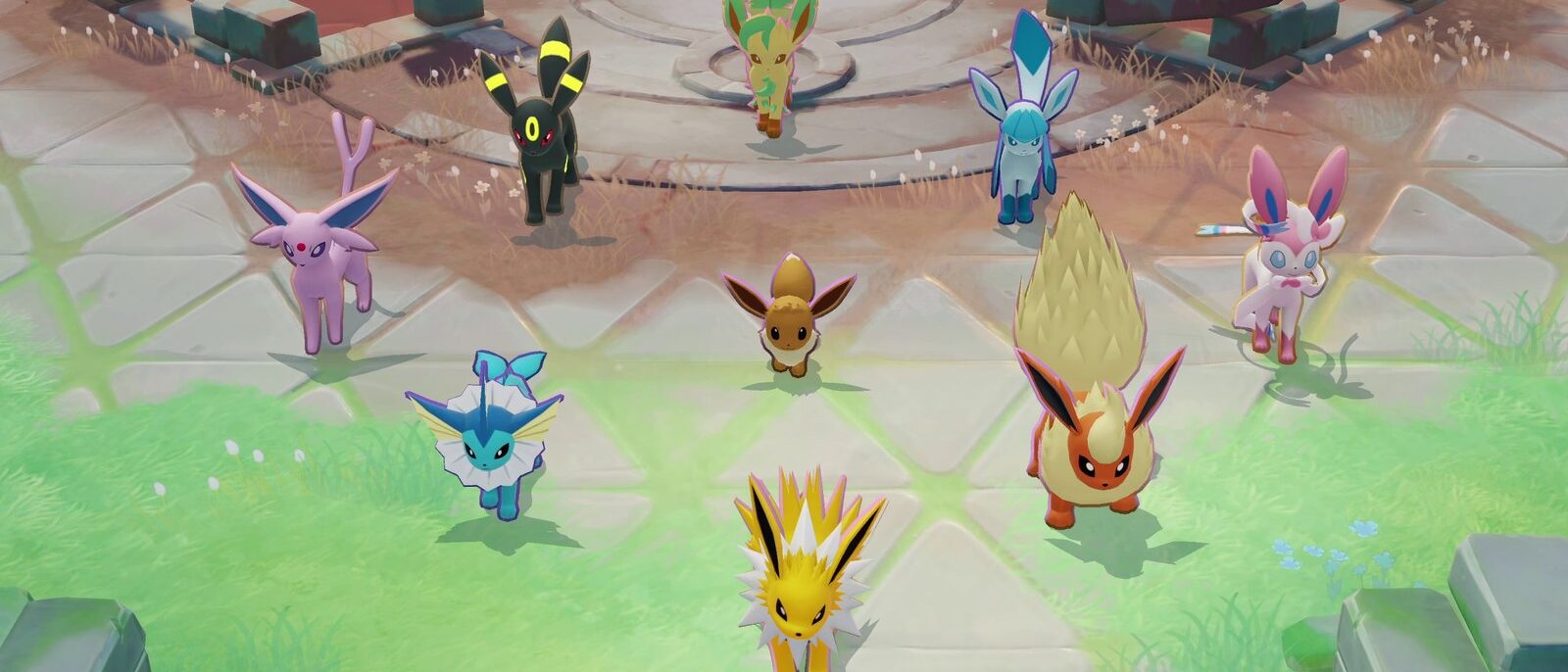 Évoli et ses huit évolutions réunis dans une arène de Pokémon UNITE