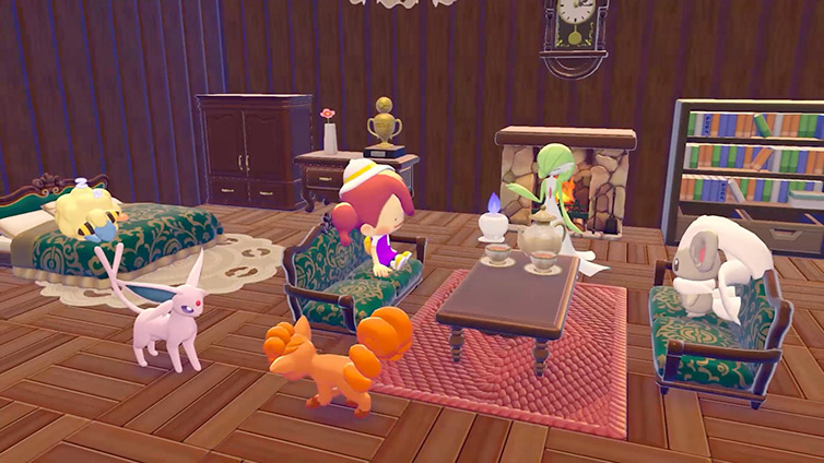 Intérieur meublé de bois avec canapé, lit et bibliothèque, où vivent plusieurs Pokémon