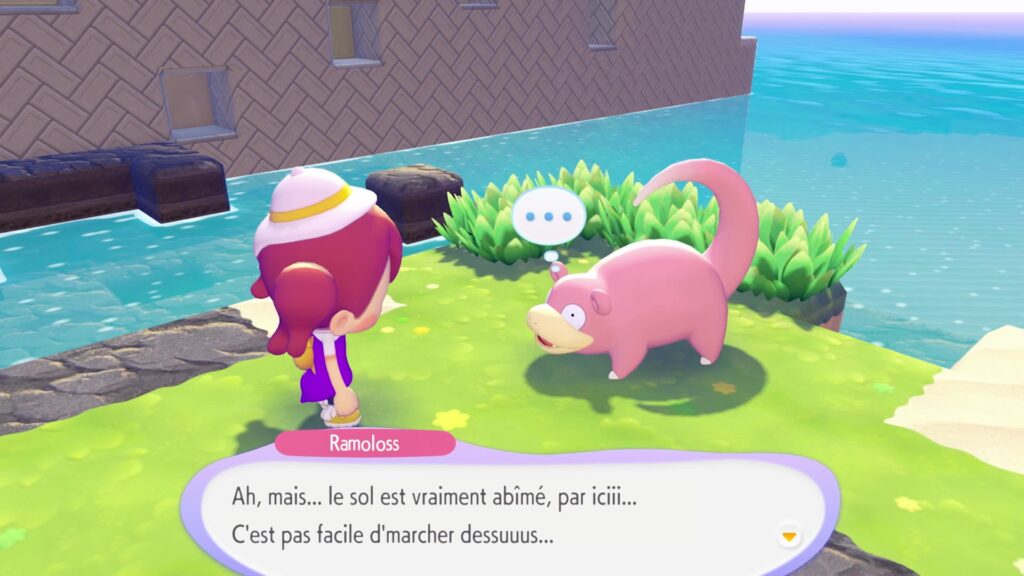 Ramoloss à Terrassec sur une bande d'herbe au bord de l'eau, avec la phrase « Ah, mais... le sol est vraiment abîmé, par iciii... »