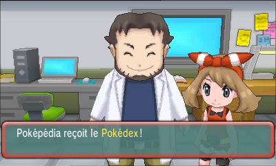 The Pokédex is given to you by Professor Birch, in the presence of May (or Brendan).