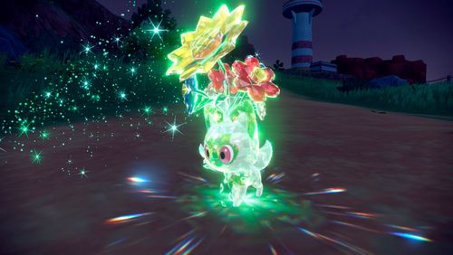 Poussacha téracristallisé de type Plante, couronné de son joyau Téracristal, dans Pokémon Écarlate et Violet